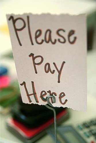 Please Pay Here sign