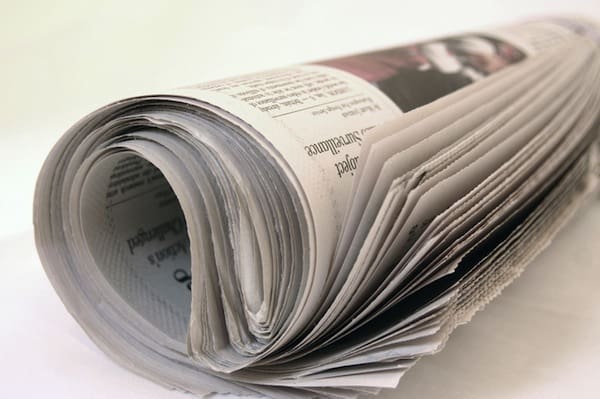 Rolled up newspaper
