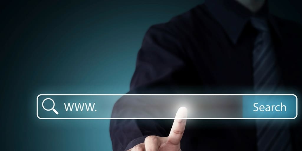 Person touching search bar