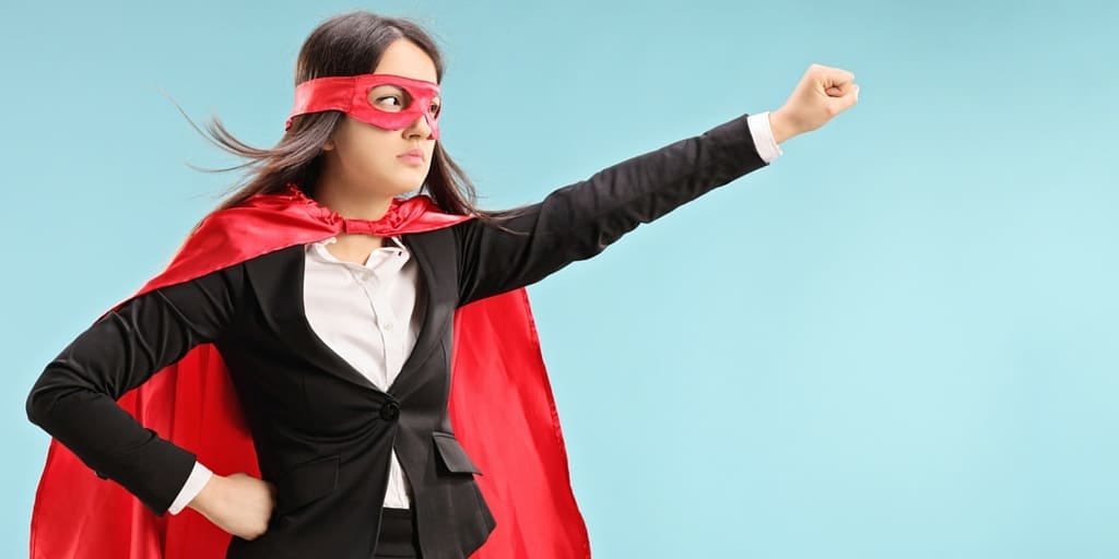 Businesswoman posing as superhero
