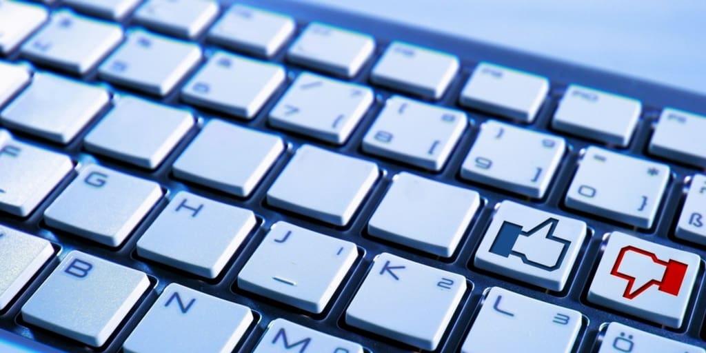 Keyboard with like and dislike buttons