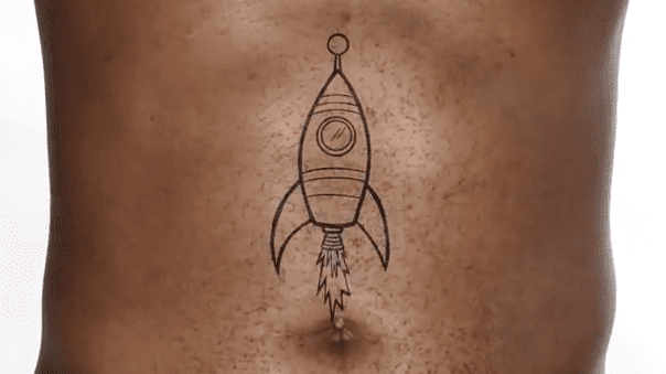 Rocket ship on man's torso