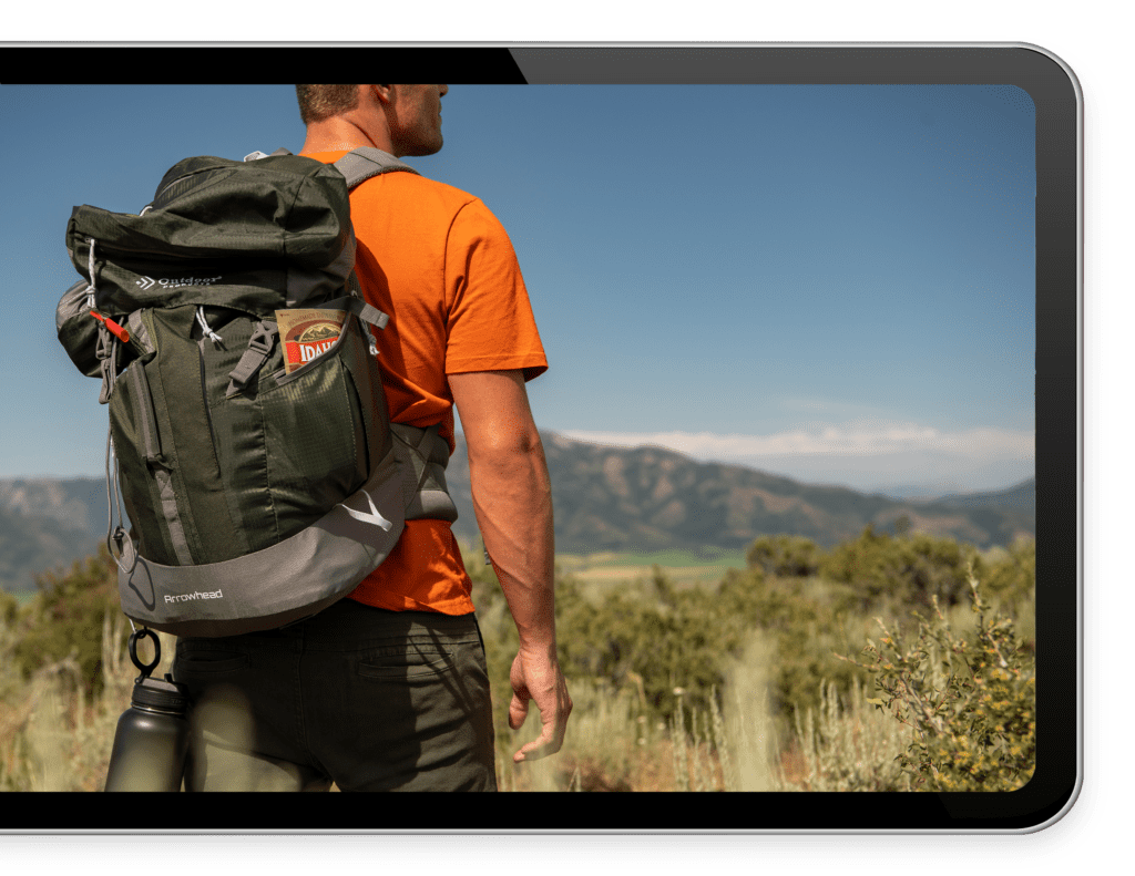 Tablet with man hiking inside