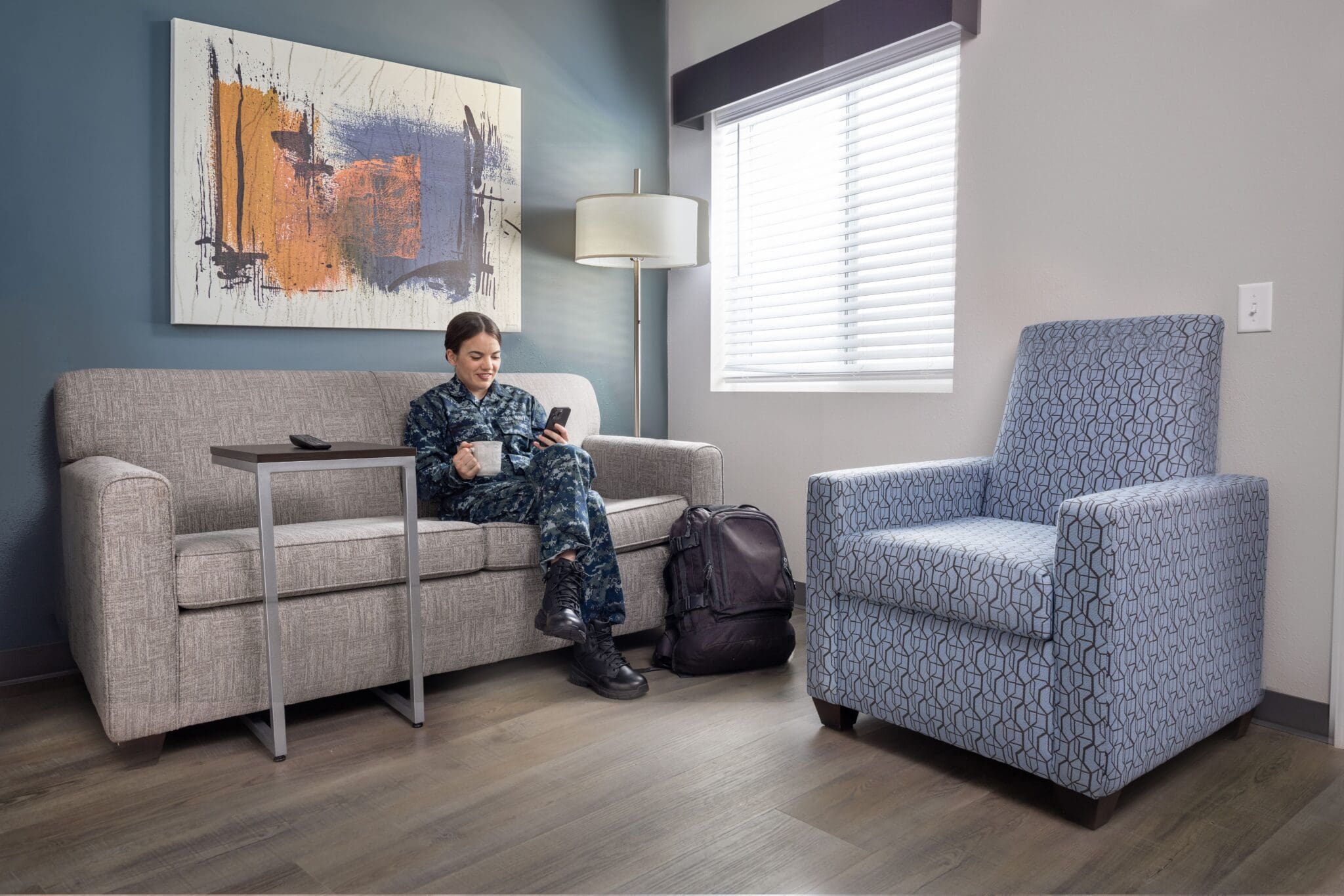 Military personnel relaxing at extended stay hotel chain, stayAPT Suites