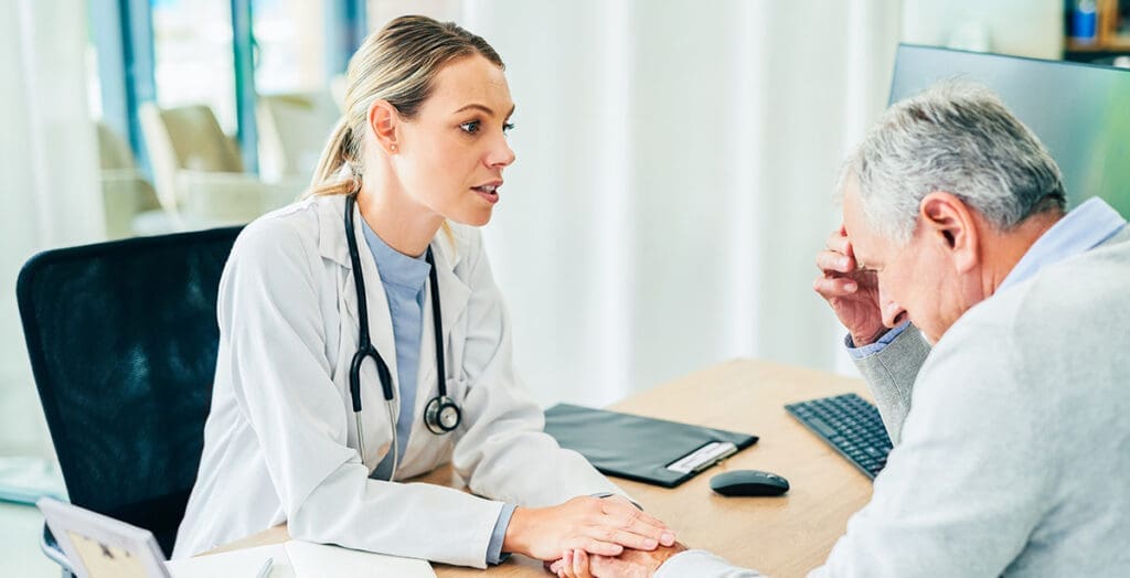 Doctor have a tough conversation with a patient